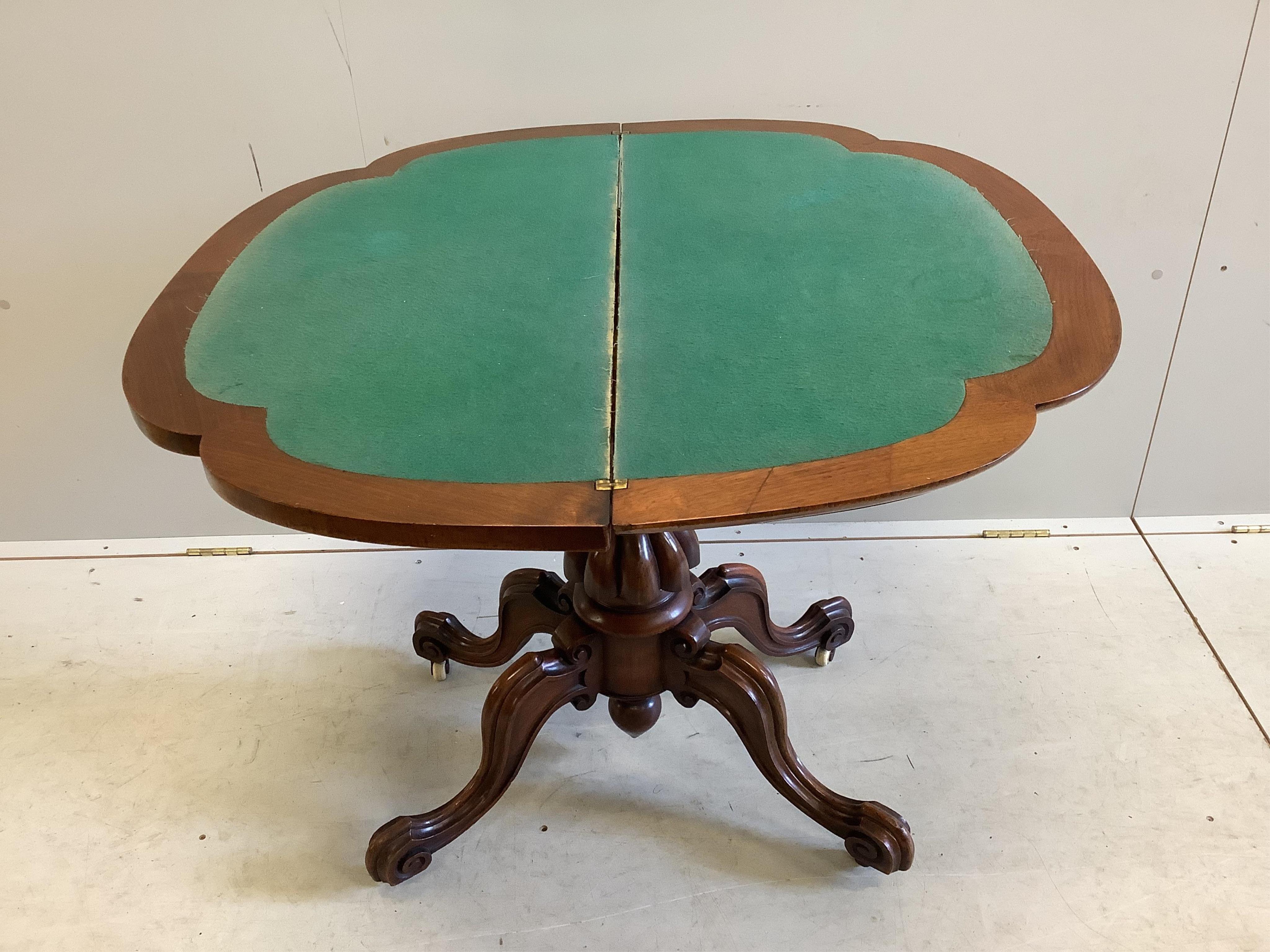 A Victoria figured walnut folding card table, width 91cm, depth 45cm, height 76cm. Condition - fair